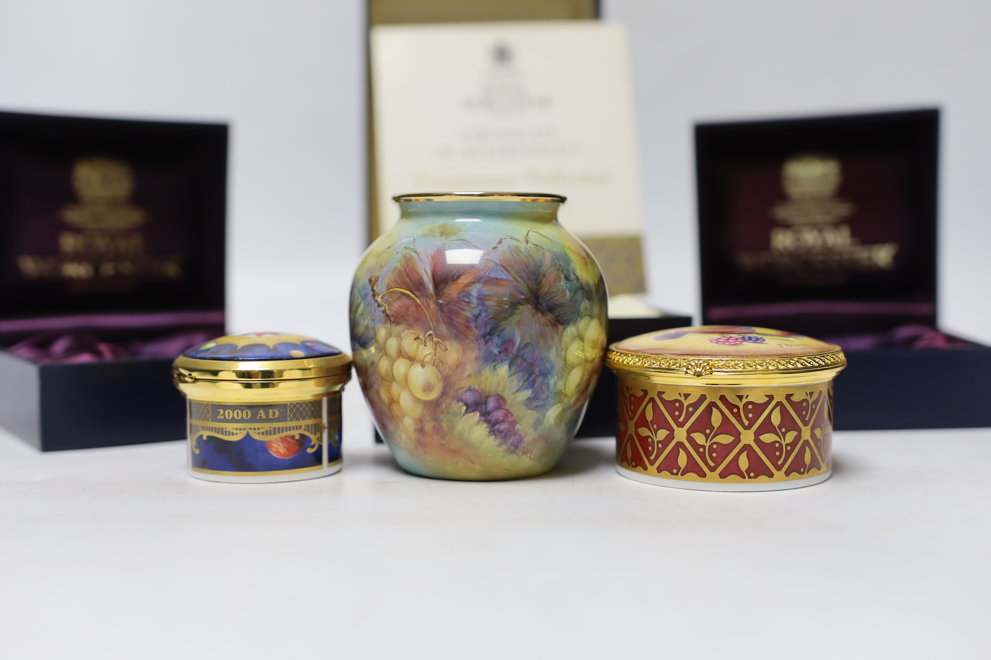 A modern boxed limited edition Moorcroft enamel vase, together with two Royal Worcester boxed porcelain boxes (3)